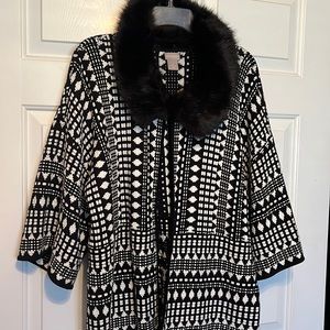 3/4 length sleeve jacket with removable fur collar.